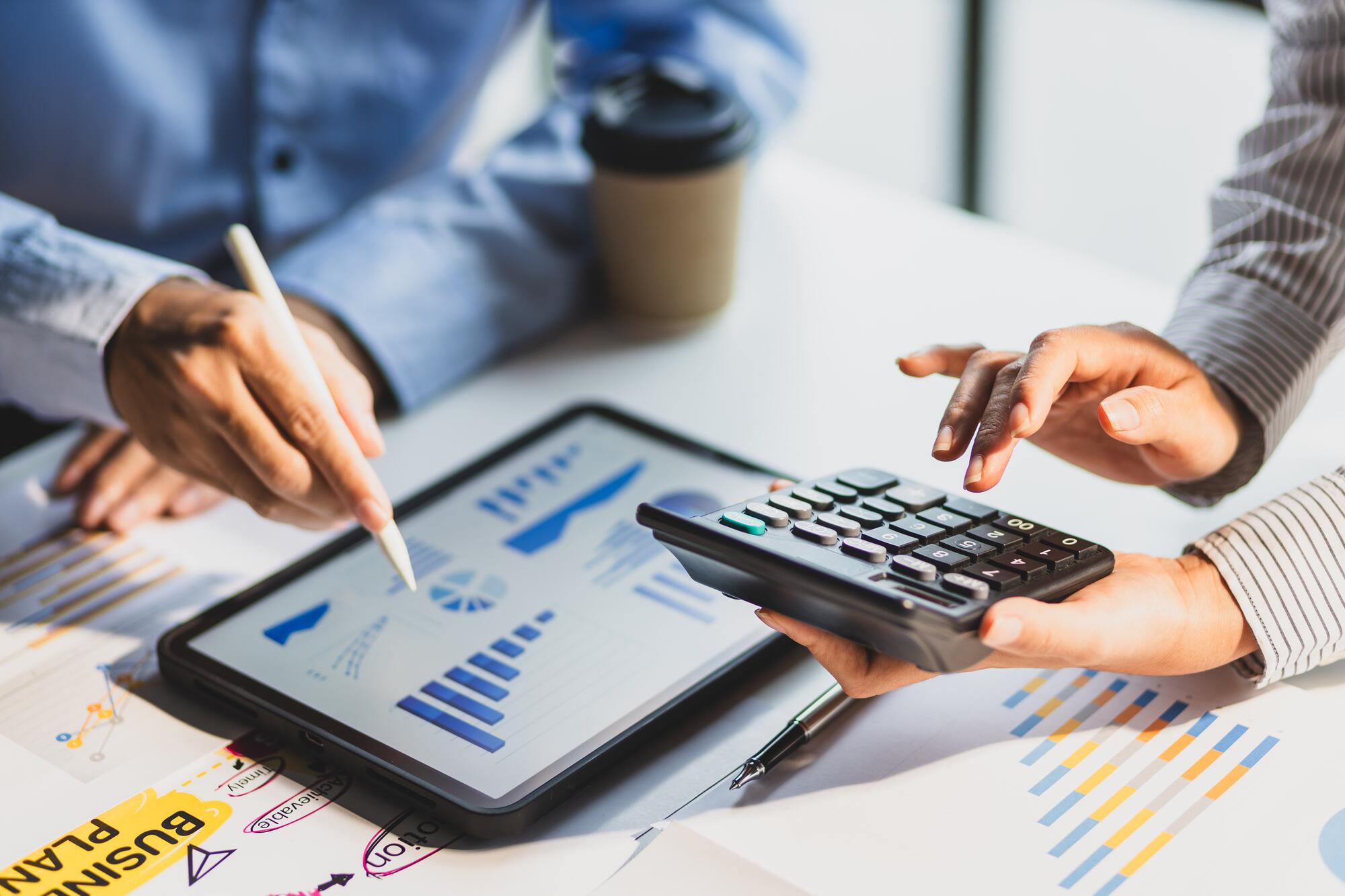 close-up-hands-financial-data